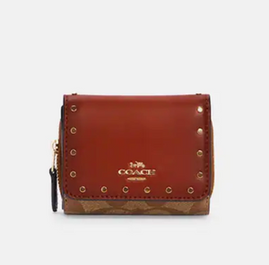 Coach Small Trifold Wallet In Colorblock Signature Canvas With Rivets