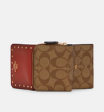 Coach Small Trifold Wallet In Colorblock Signature Canvas With Rivets